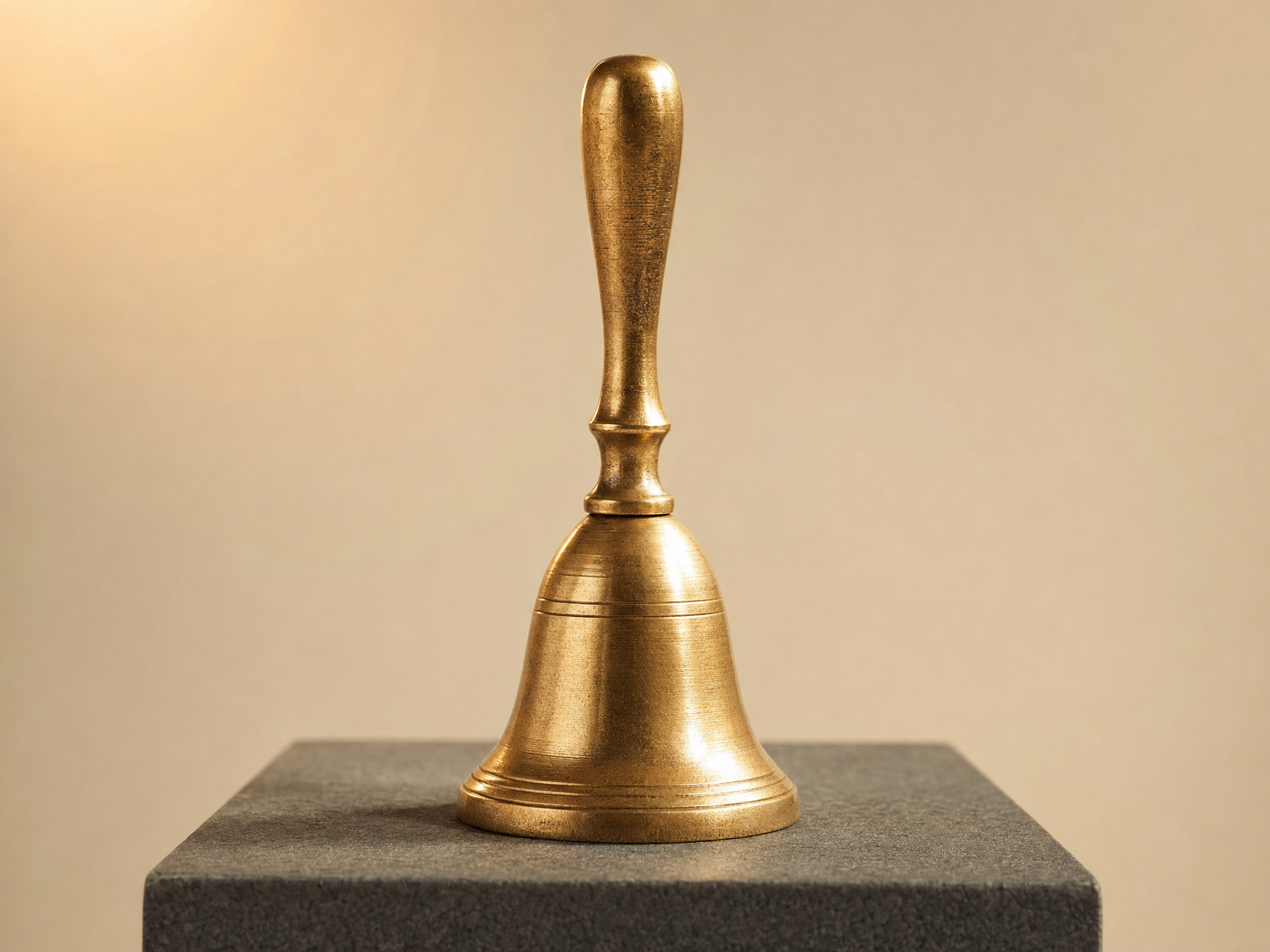 Brass hand bell representing VibeTech's church client work